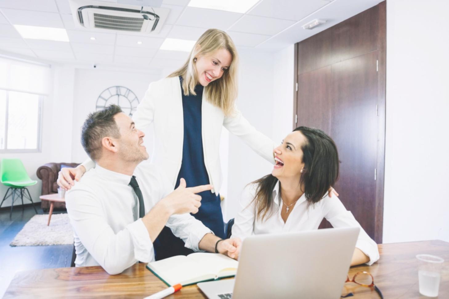 Students engaged in interactive budgeting workshop with financial planning materials